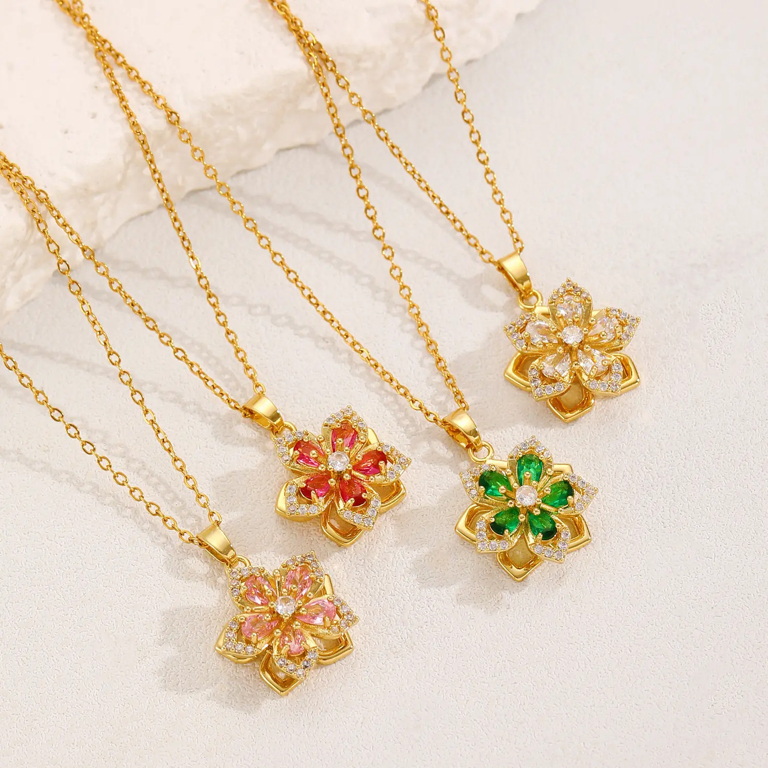 Women’s spinning stress relief necklace 14K gold plated flower fidget necklace with rotating pink crystal design. Adjustable chain with sparkling cubic zirconia details Perfect summer jewelry and a cute gift for girls.The perfect Mother’s Day gift