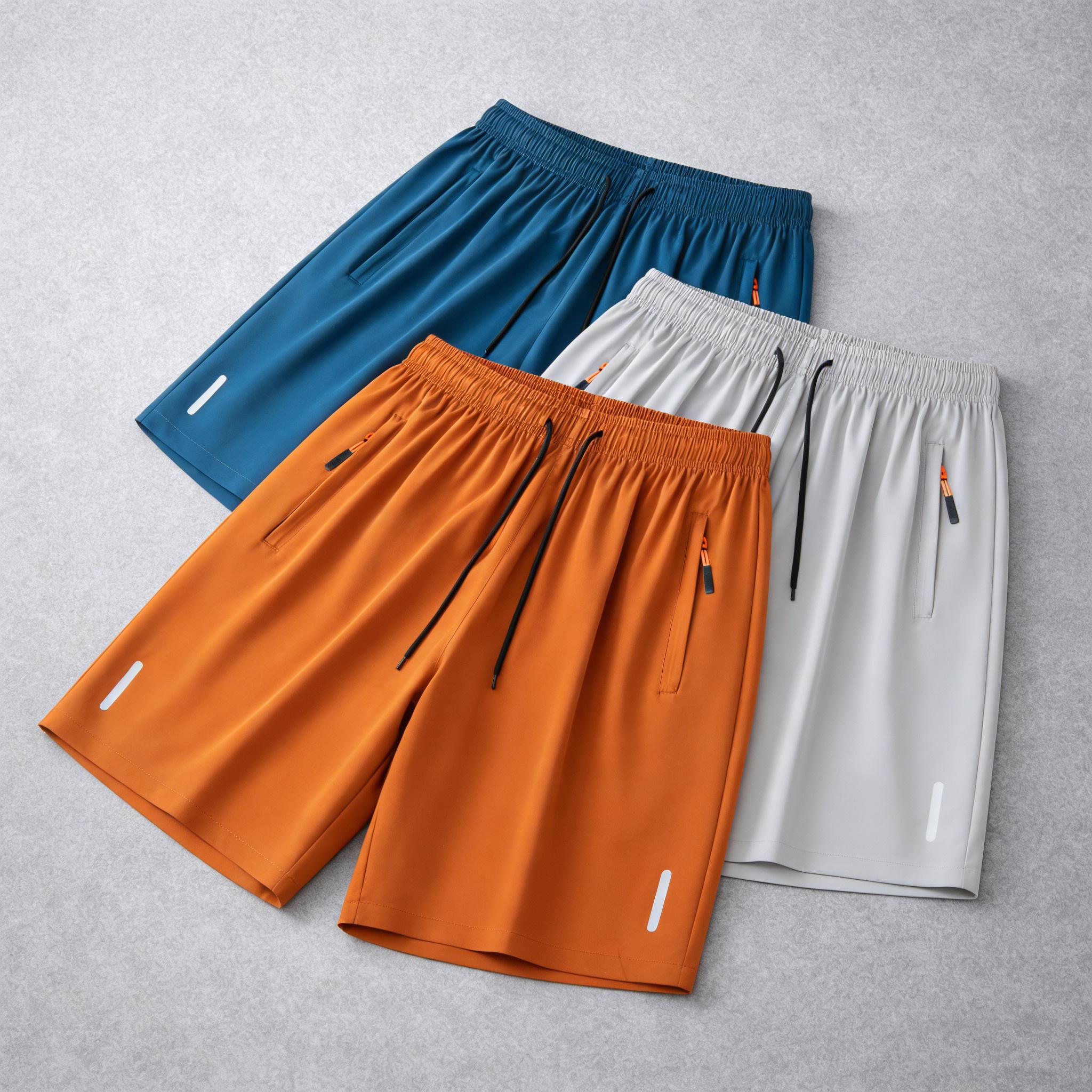 7-pack men’s ice silk quick-dry athletic shorts featuring zippered pockets and contrasting zipper head design; breathable, lightweight ice silk summer shorts for fitness, running, and casual wear—an essential for workouts and comfortable for home wear in