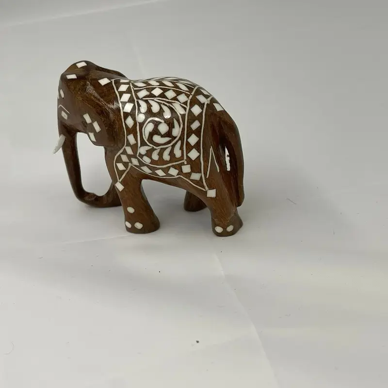 Handcrafted Wooden Elephant Figurine with Intricate White Inlay Design