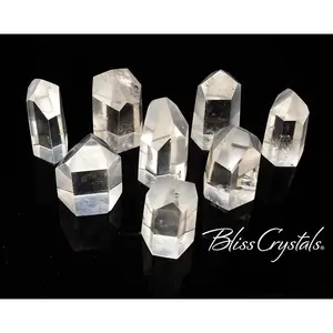 Clear Quartz Faceted Medium Crystal Point Generator