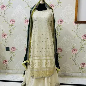 Asim Jofa Elegant Cream Shirt Lehenga Set with Intricate Embroidery and Black Trim Accents