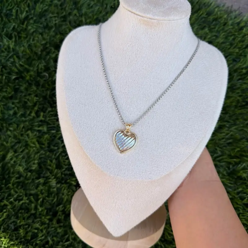 Swivel mixed metals heart necklace Swivel mixed metals heart necklace