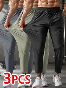 Men’s casual athletic sweatpants, 3-pack, elastic waistband with drawstring and zippered pockets, suitable for gym workouts