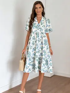 A women's V-neck short-sleeve midi dress with a layered skirt, featuring white fabric with blue hydrangea prints. It exudes an everyday, Casual style, suitable for city shopping, afternoon tea with friends, or light commuting occasions Womenswear