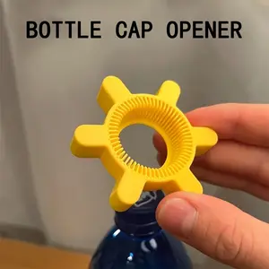 1Pc manual plastic can opener with easy-to-grip swivel cap design and ergonomic handle. Perfect for opening soda and beverage bottles, it's a must-have kitchen tool. Its fun design is practical