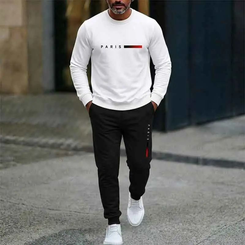 Minimalist men’s athletic two-piece set: white crewneck hoodie without hood with Paris logo print + black jogger sweatpants with elastic cuffs; soft fabric; suitable for everyday wear, going out, and casual jogging.