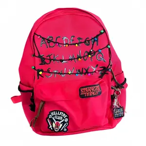 Stranger Things Red Backpack with Alphabet Lights & Hellfire Club Patch Vibrant red Stranger Things themed backpack featuring iconic alphabet string lights and Hellfire Club patch Durable spacious perfect for school travel  daily use for all Hawkins fans