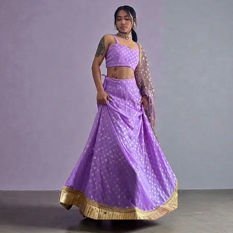 Elegant Purple Lehenga  – Perfect for weddings and festive occasions! Featuring intricate designs, flowing fabric, and a royal hue that makes you shine.  Shop now and dazzle every celebration!