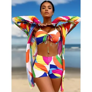 a must-have for beach vacations and the top choice for pool parties 2026 popular rainbow geometric print three-piece swimsuit set, colorful swimwear, lace-up front cropped top, high-waisted shorts, and matching long-sleeve sun protection cover-up, one