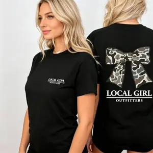 Coquette Bow Camo Tee – Pretty meets bold.The oversized tee that steals the scene, softly.  tiktok shop deals    graphic tee Piece Feminine Streetwear Statement Womenswear