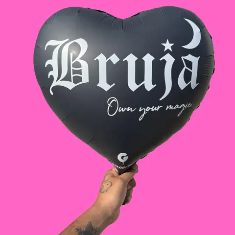 Bruja Own Your Magic Globito 18 inch heart shape balloon translates to Wich Own your magic