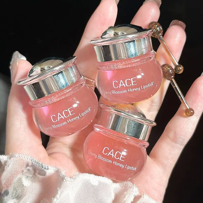 Lip oil Sakura honey moisturizing lip balm Moisturizer, hydrating and locking in moisture for plump lips without stickiness or feathering in colorful lipstick.