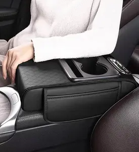 Black and red 5-in-1 car center console armrest cover, including 2 storage bags, cup holders, tissue slots, and phone slots, one set for storage inside the car.