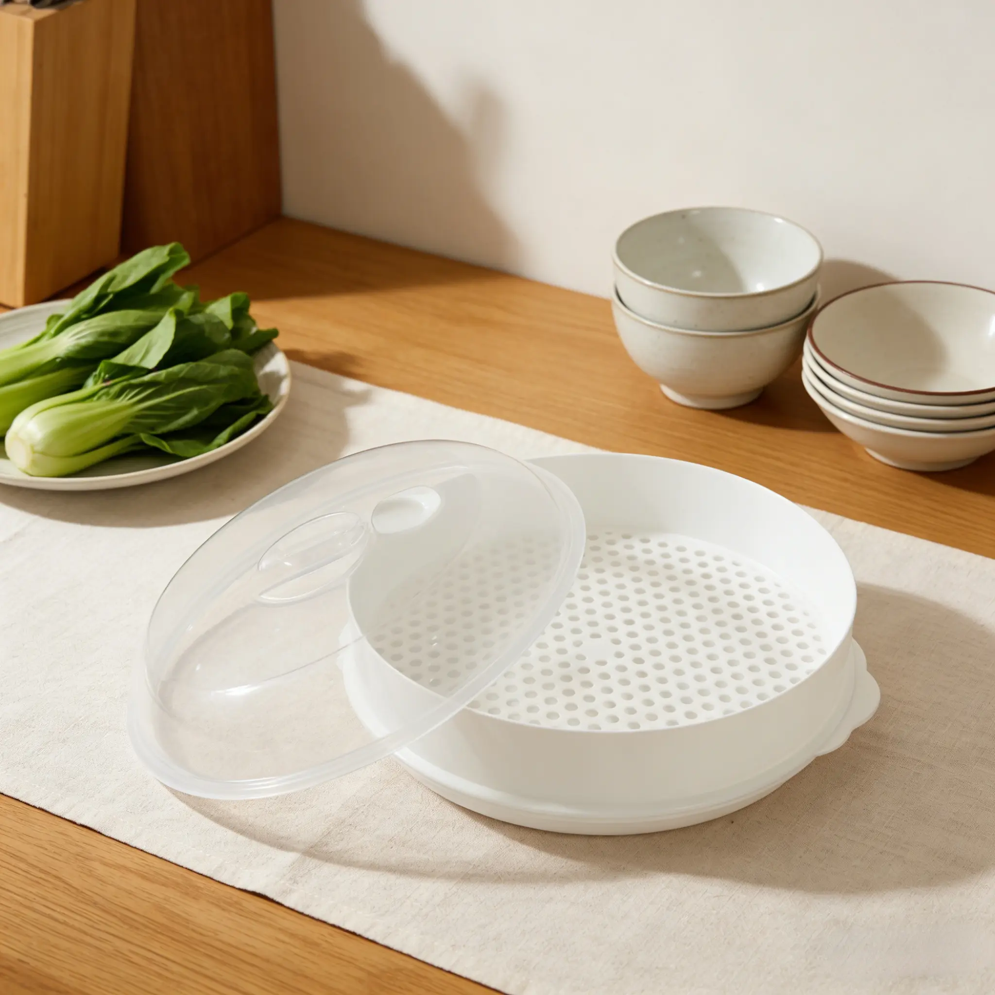 Microwave steamer with transparent lid, round steaming container with drain holes, multi-functional portable steamer cookware, suitable for steaming dumplings, buns, shrimp, vegetables and more, for daily kitchen steaming use