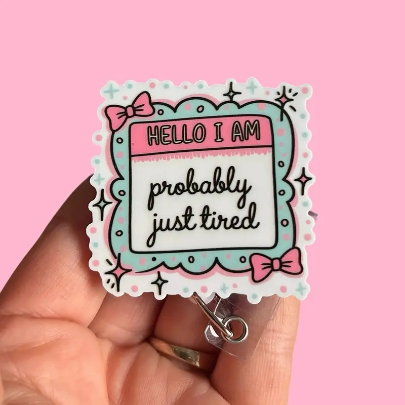 Glitter My Badge Hello I’m probably just tired badge reel for nurse and hospital workers. Badge clip Badge pull - Retractable swivel clip with a 360 rotation. Great gift for coworkers. Funny badge reels