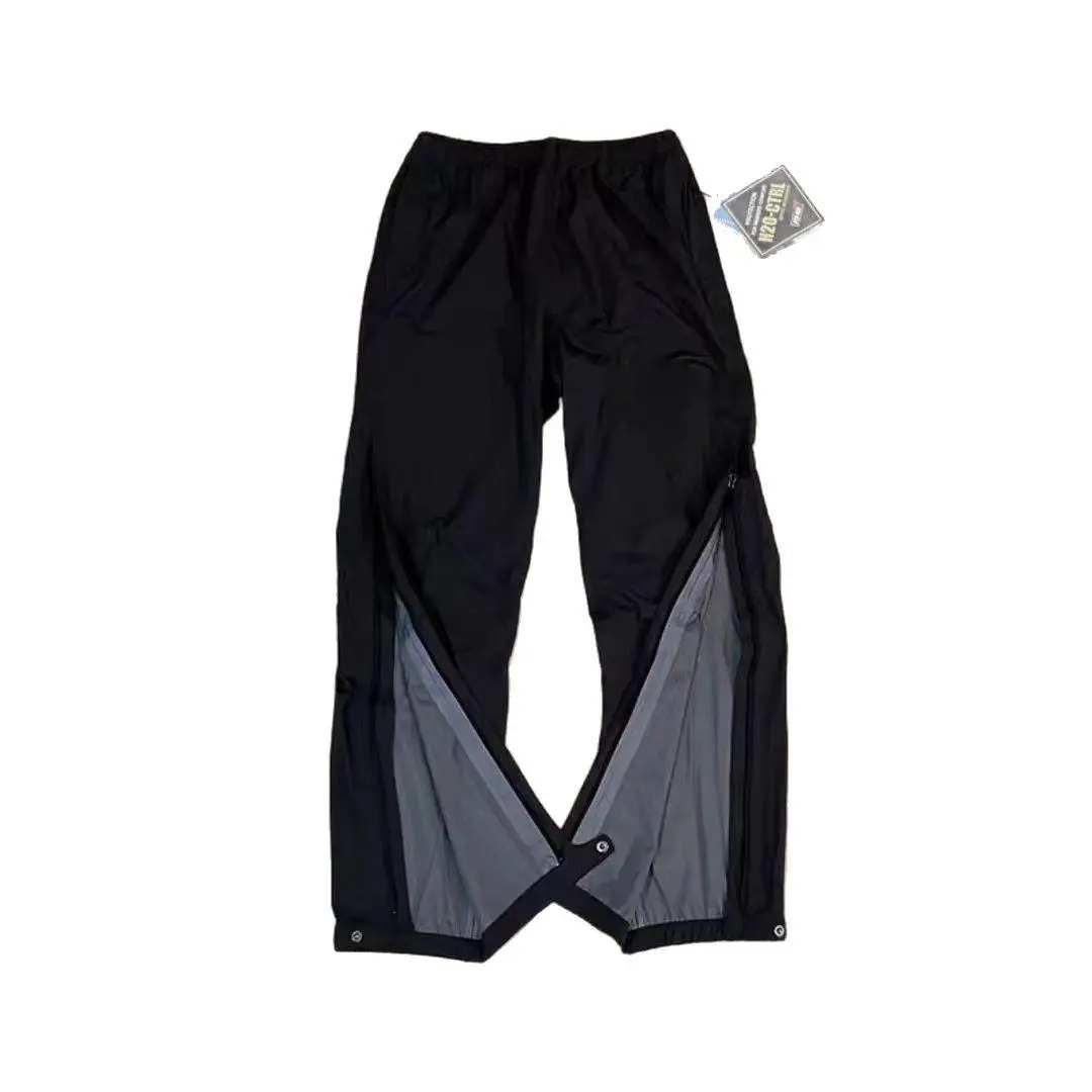 Outdoor sports rainstorm-proof storm pants side zipper LGTX full-pressure glue hard shell rainproof breathable can be stored mountaineering pants men
