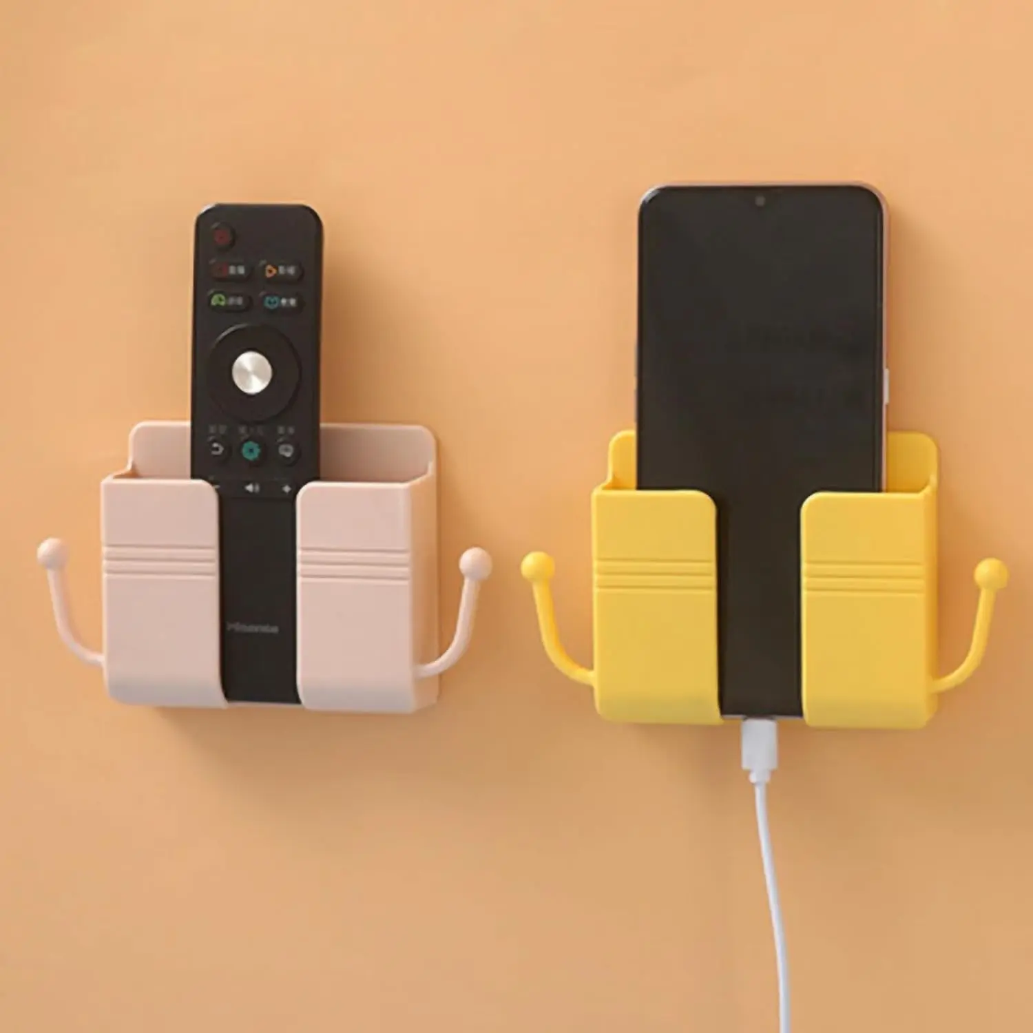 2PCS Mobile phone holder mounted on self-adhesivewall, wall-mounted mobile phone holder with hook andcable clip, wall-mounted mobile phone holder withcharging plug and wall regulator, remote control suitablefor kitchen and living room, (random colors)