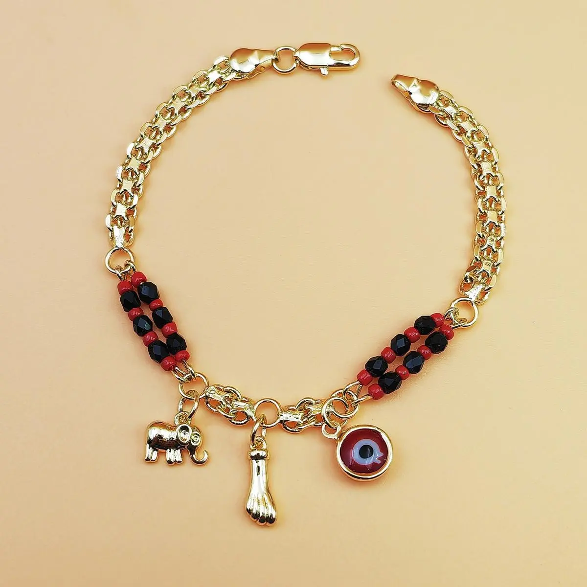 Boho Red & Black Beaded Elephant Charm Bracelet with Golden-Plated Devil's Eye, Elephant Pendant, Unique Bohemian Jewelry for Parties & Festivals, Year-Round Gift