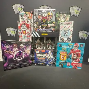 Break #415 2x 2025 Moasic Ornament Box, 1x 2025 Revolution Bundle, 1x 2025 Elite Mega, 1x 2024 Resurgence Blaster,1x 2024 Resurgence Mega, 1x 2024 Mosaic Mega, 1x 2023 Asia Prizm Hobby, 1x 2022 Mosaic Hobby Blaster - All cards ship.