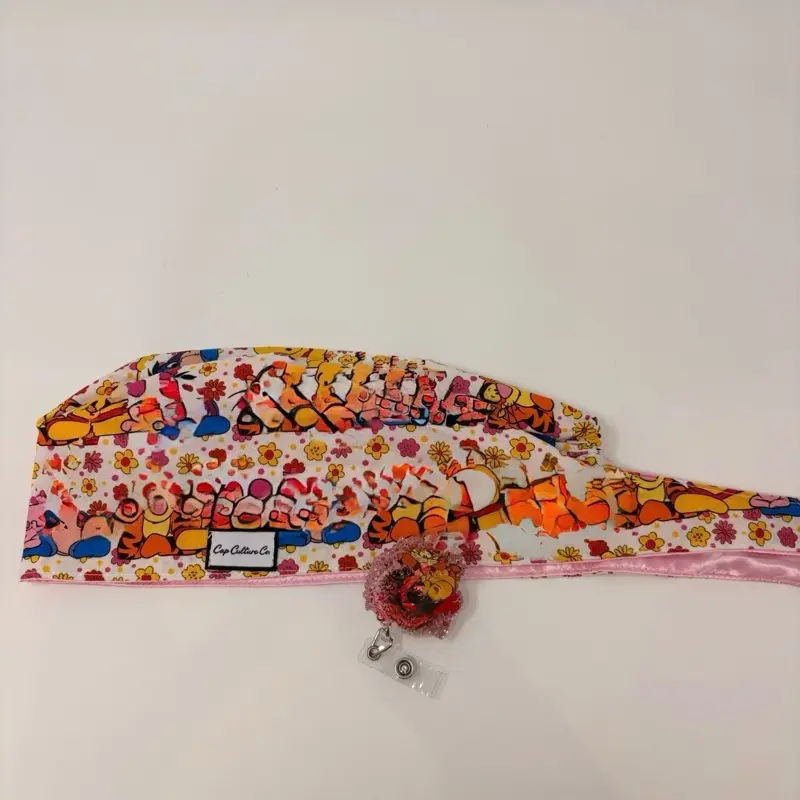 Scrub cap and badge reel