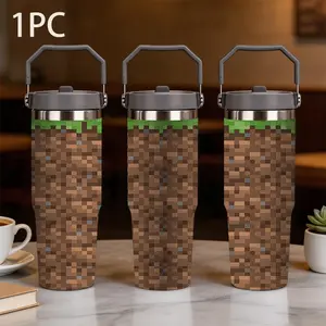 1pc 30oz portable insulated cup printed with the pixel patterns of Minecraft's grass and dirt blocks. It features a large-capacity stainless steel leak-proof design, a bright green gaming style, and is a trendy pixel art water bottle for gamers on the go.