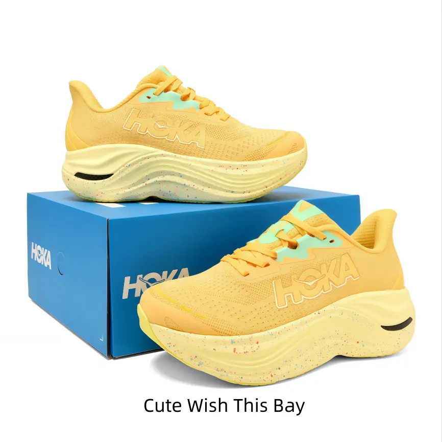 Bright warm yellow running shoes with mint green accents, speckled wave midsole ideal for sunny trail jogs and outdoor hiking trips