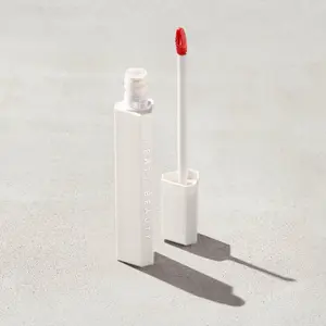 Fenty Beauty Poutsicle Hydrating Lip Stain — Zesty Bestie, coral shade —  glossy finish cosmetic