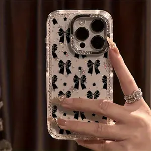 Black bowknot pattern, rhinestone and laser decoration, silver diamond-encrusted photo frame, anti-slip and drop-proof protective case, suitable for iPhone 17, 16, 15, 14, 13, 12 and other series models. Can be given as a gift to friends or family.