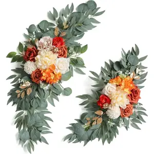 A set of 2 burnt orange artificial arched flowers, Vibrant faux flowers, featuring burnt orange petals paired with white hydrangeas, surrounded by green leaves, are perfect for wedding welcome signs, and ceremony sign decorations