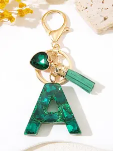 1pc/ Initial keychain accessories - Green crystal glue letters key ring chain - Heart tassel key chain - Attractive car backpack earphone case hanging piece - Preferred gift choice - Bling bling keychains, Keychain for bags
