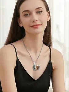 🐾｜PSA: They walked beside you. Now they fly with you. This heart wings paw print necklace holds their photo close to your heart—always. 👼 Carry their spirit wherever you go. #heartwingspawprintnecklace #petmemorialjewelry #keepsakenecklace