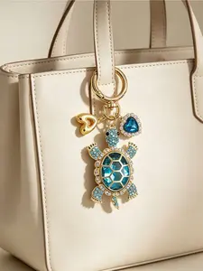 Ocean-style zinc alloy turtle keychain, inlaid with crystal heart and A-Z golden letters. Cute and durable, ideal for bag and car decor. Perfect for beach lovers, daily use and all kinds of holiday, birthday and bridesmaid gifts.