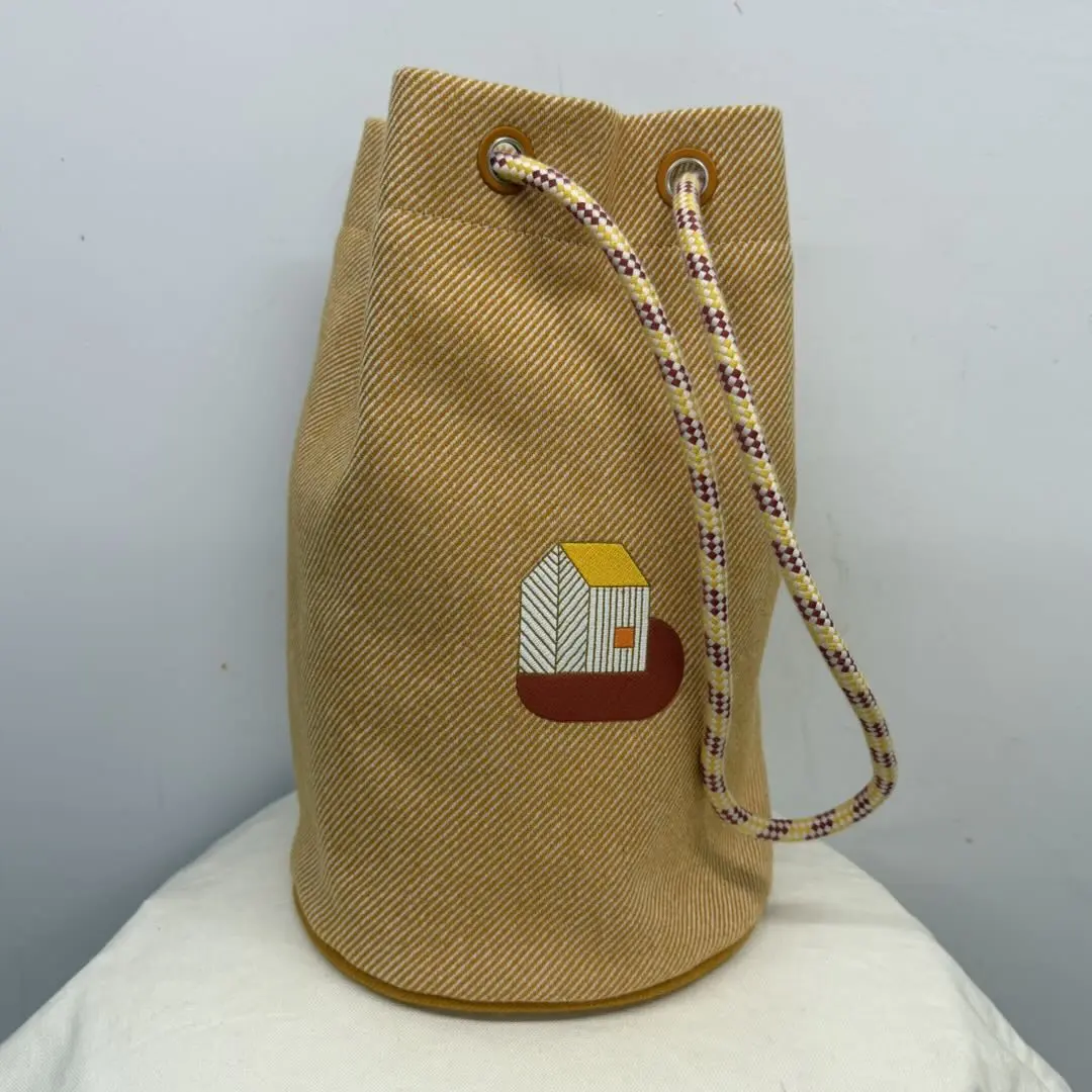 Pre-owned HERMÈS Garden Cottage Drawstring Backpack / Duffle Bag in Beige and White Striped Canvas (Style Code: B2512017)