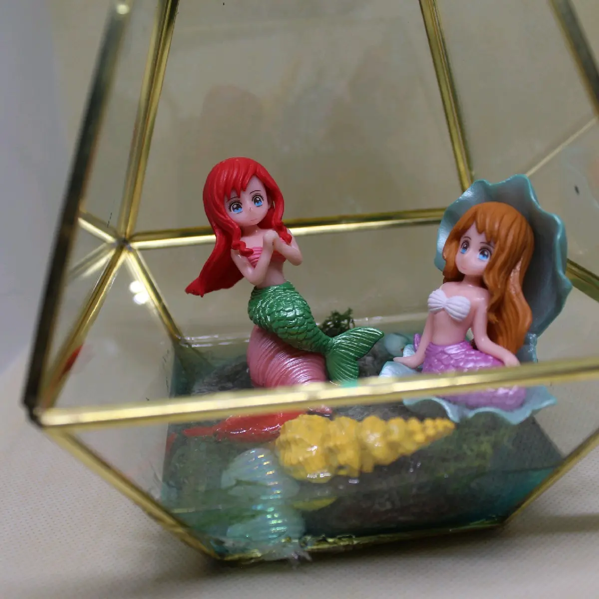 Two mermaids hanging out. glass hanging terrarium