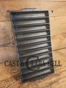 WOW, very cool. Raised Erie No. 22 Breadstick Pan.  Early 1900's No. 22 Corn Bread Pan, 11 cup 954