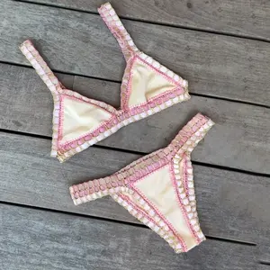 2026 new women’s triangle bikini bag set—chest-support mini two-piece swimsuit; fashionable, sexy low-rise split design swimwear set for casual vacations, beachwear, and hot spring wear.
