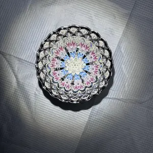 Luminous Silver-Toned Porcelain Teacup with Peacock Feather & Lotus