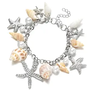 Seashell Charm Bracelet for Women by Ginger Lyne Gold Plated Pearls Starfish and Shells