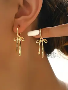 Professional Gold Bow Hoop Earrings - Polished Ribbon Jewelry for the Office
