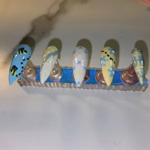 Spring Bee Nails - Colorful Design with Blue, Yellow, and White Patterns, Ideal for Nail Art and Decorative Use