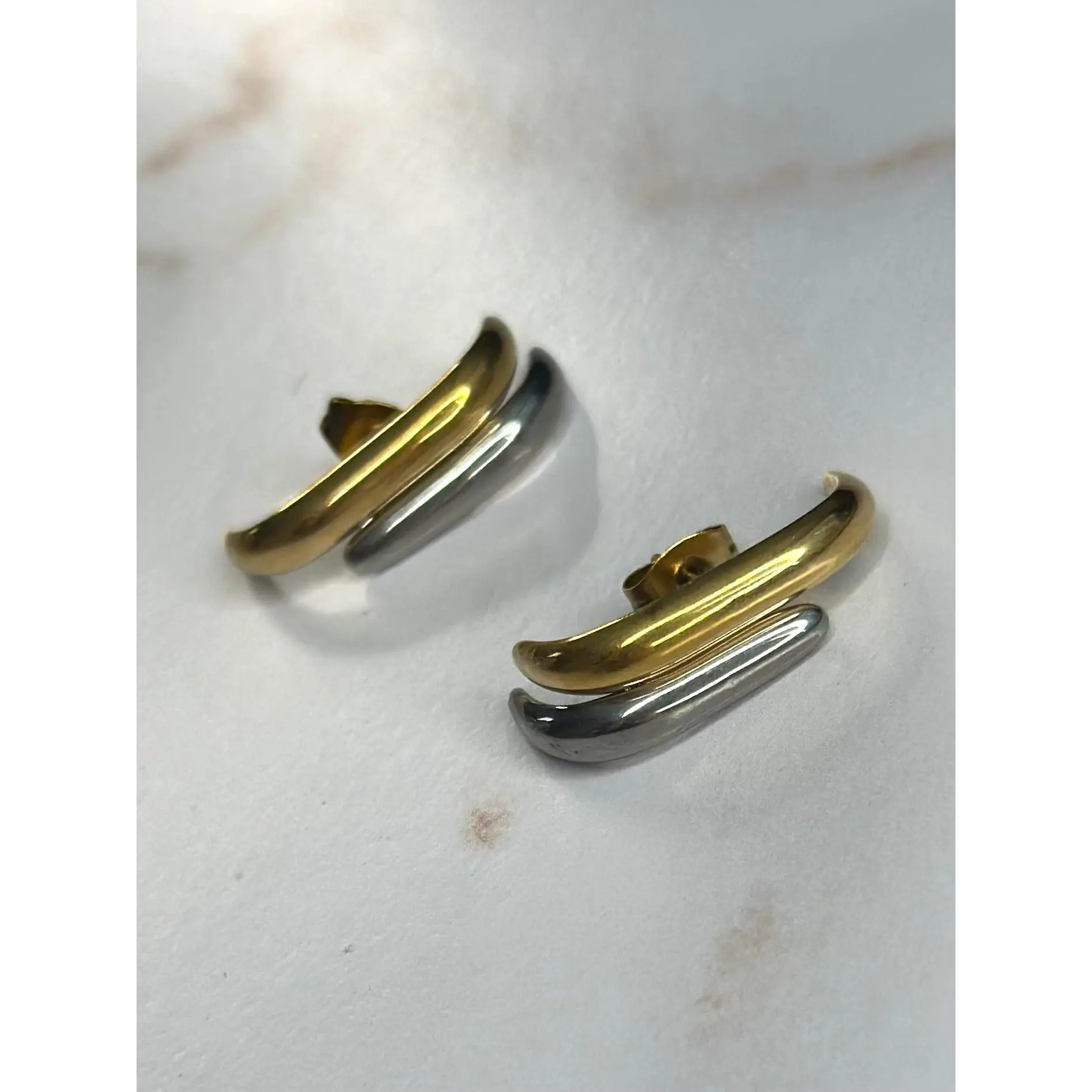 AC’s Two tone bar earrings