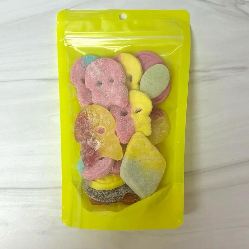 SWEDISH CANDY OVALS AND SKULLS MIX - A HALF-POUND MIX OF RARE OVALS AND SOUR SKULLS Sour Gummy Flavor Sweet Sour Assorted