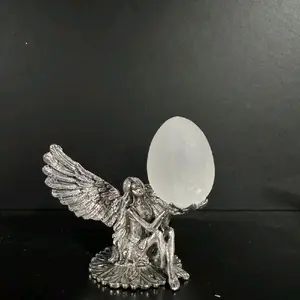 Selenite egg with fairy base