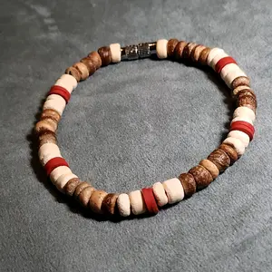Coconut bead bracelet with screw twist closure.