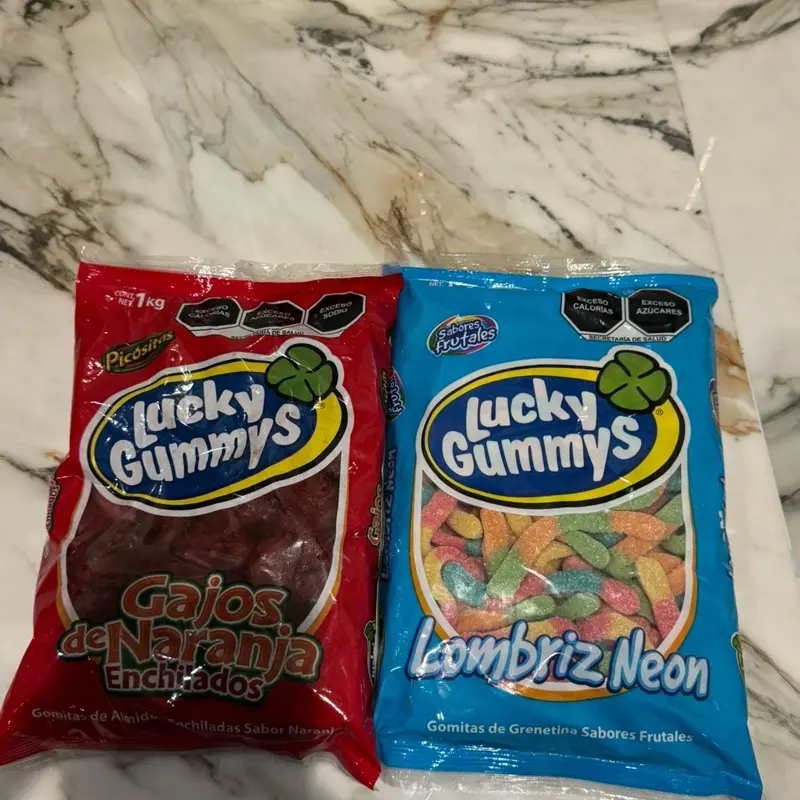 Lucky gummy sugar gummy worms or spicy oranges