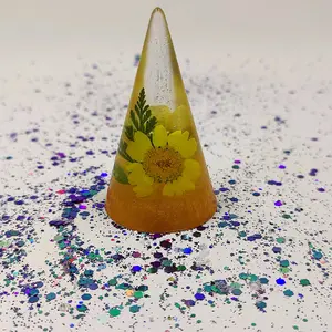 Resin ring cone display with pressed flowers