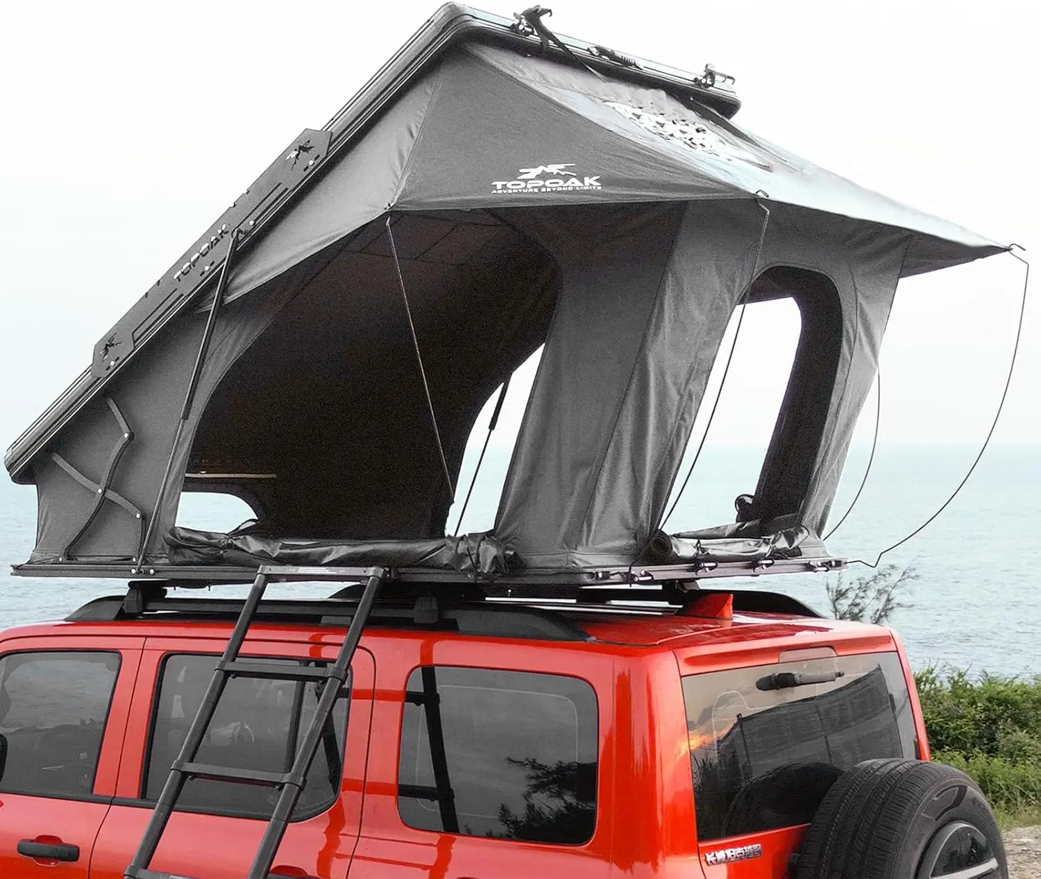 TOPOAK Nebula XL X-Frame Hard Shell Rooftop Tent for SUV Truck Jeep | X-frame roof top tent with extra legroom, open interior and full-cover rainfly for overland camping.