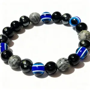 Color-matched beaded crystal bracelet, featuring natural yellow crystal, malachite, and auspicious abundance charm. Suitable for both men and women to wear.