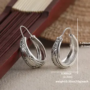 Retro engraved pattern hoop earrings, with a simple and vintage style. They are made of zinc alloy and are fashionable jewelry, making them an ideal gift for women.