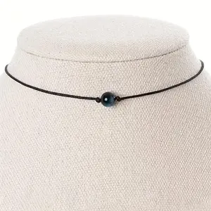 Handcrafted Black Rope Necklace Featuring a Single Obsidian Bead, Designed for Everyday Wear with a Easy Style That Promotes Third Eye Balance And